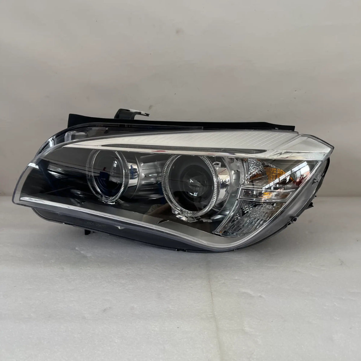 BMW X1 E84 Bi-Xenon Scheinwerfer links 63117290261
